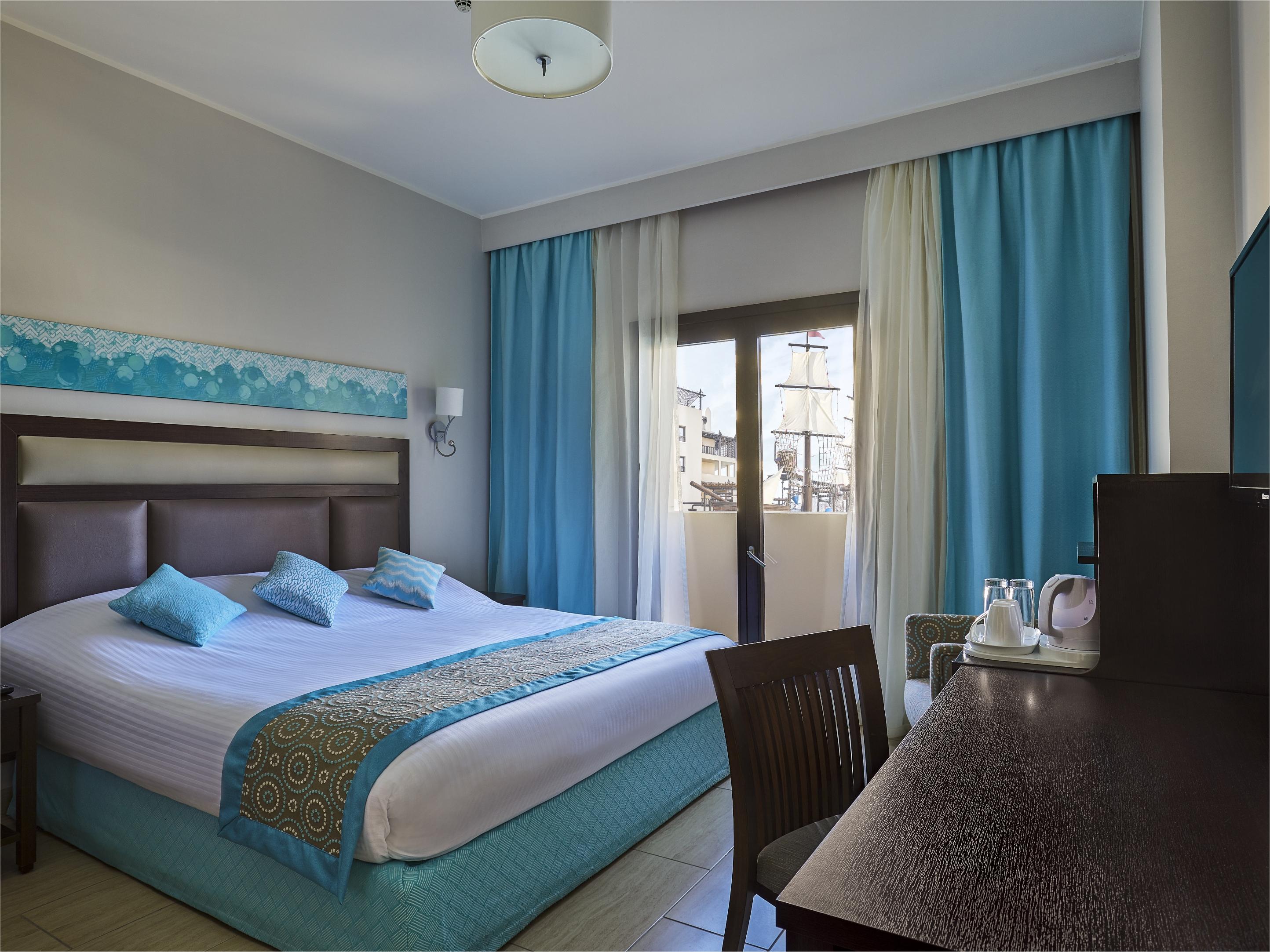 Steigenberger Aqua Magic, All Inclusive Hurghada Esterno foto A bedroom in a hotel